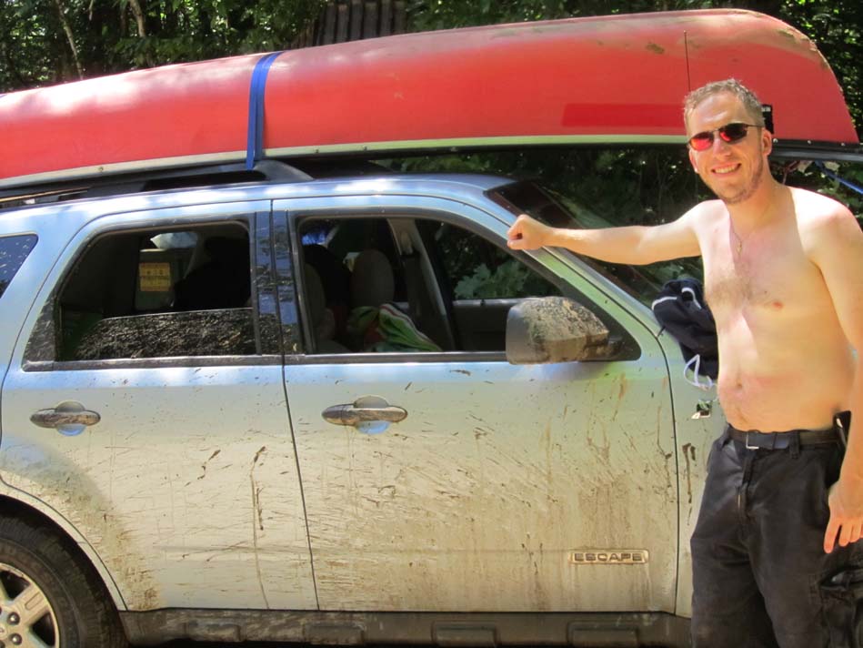 Christopher Carr Next to His Ford Escape after picking his canoe up on the Pemigewasset River